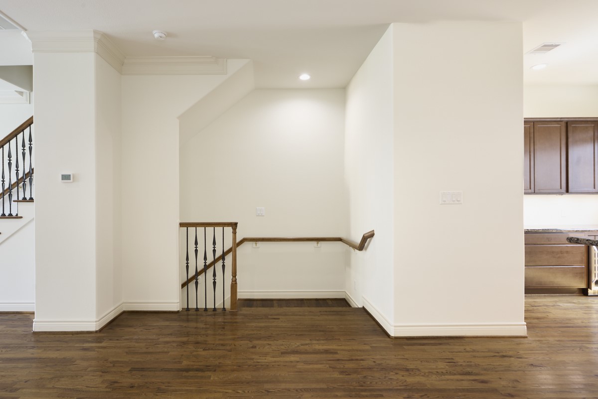1026 Wagner Street Houston, TX 77007 - Photo 10 of 33 a view of an empty room with wooden floor