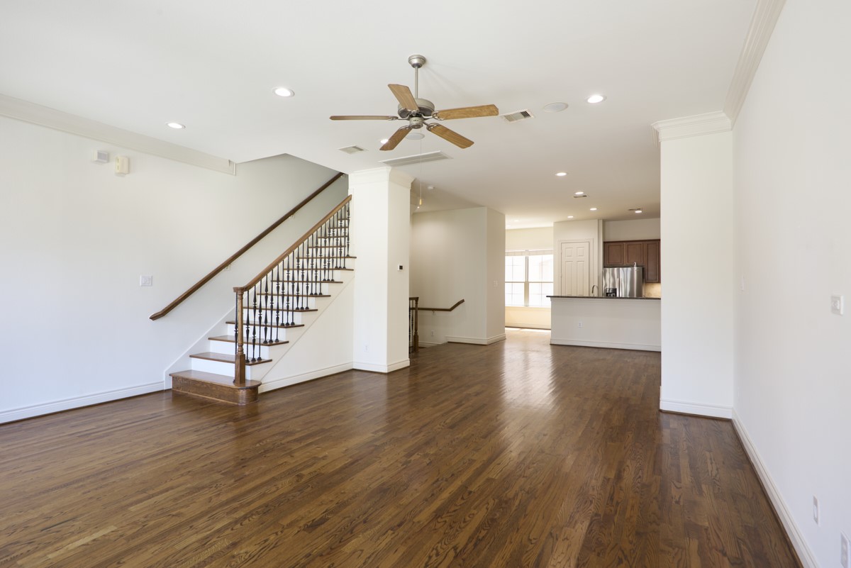 1026 Wagner Street Houston, TX 77007 - Photo 5 of 33 a view of a hallway with wooden floor and staircase