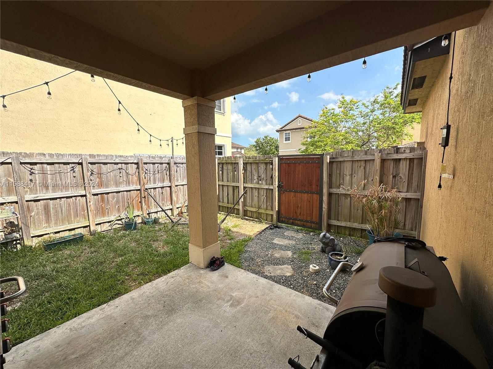 11606 Southwest 245 Terrace Homestead, FL 33032 - Photo 23 of 27 a house view with a garden space