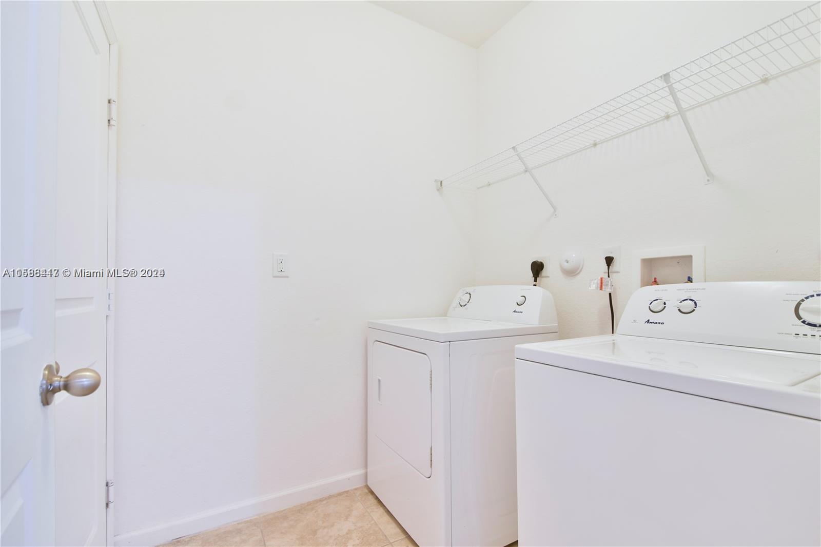 11606 Southwest 245 Terrace Homestead, FL 33032 - Photo 24 of 27 a utility room with dryer and washer