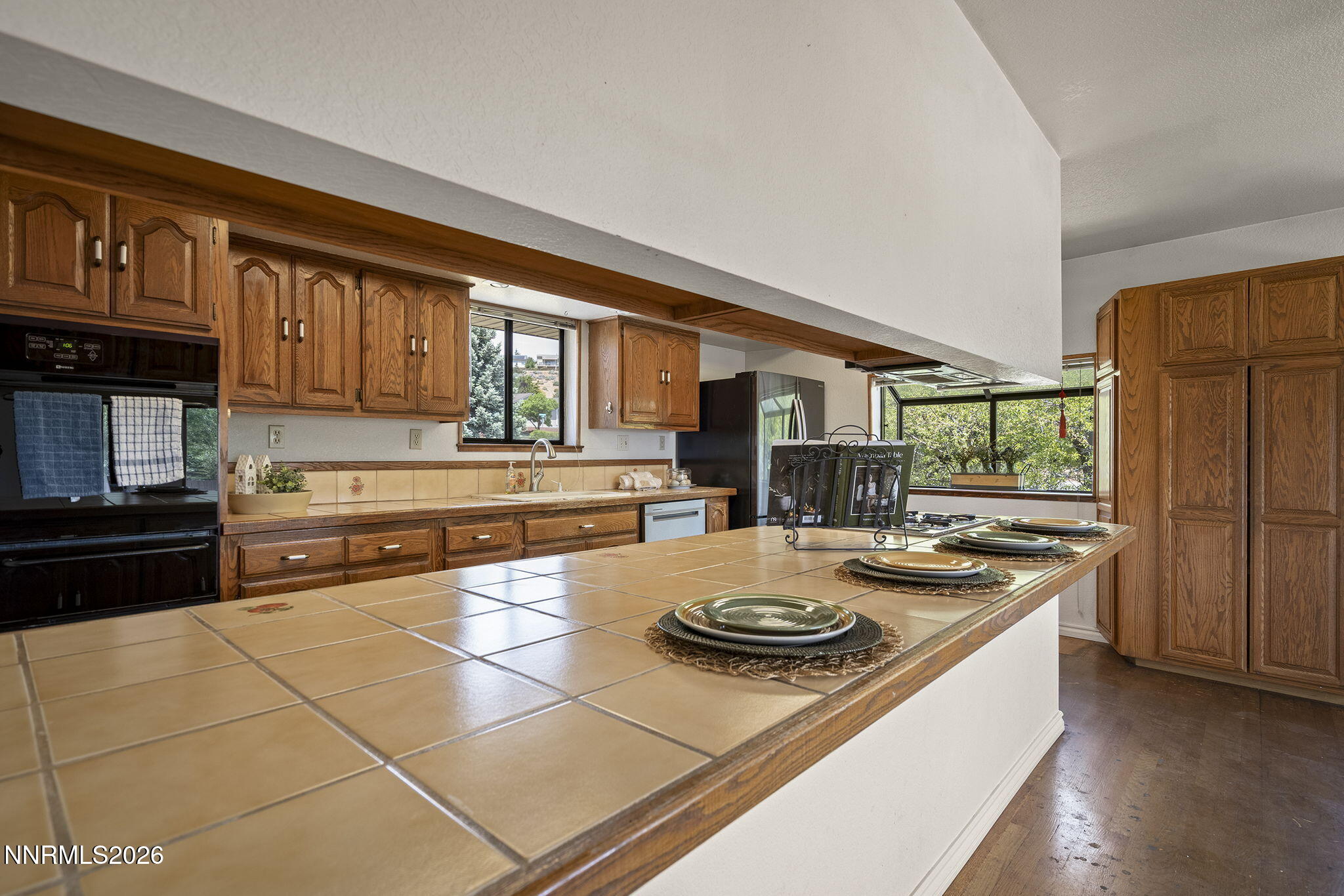 2985 Socrates Drive Reno, NV 89512 - Photo 40 of 52 a kitchen with a stove and a refrigerator