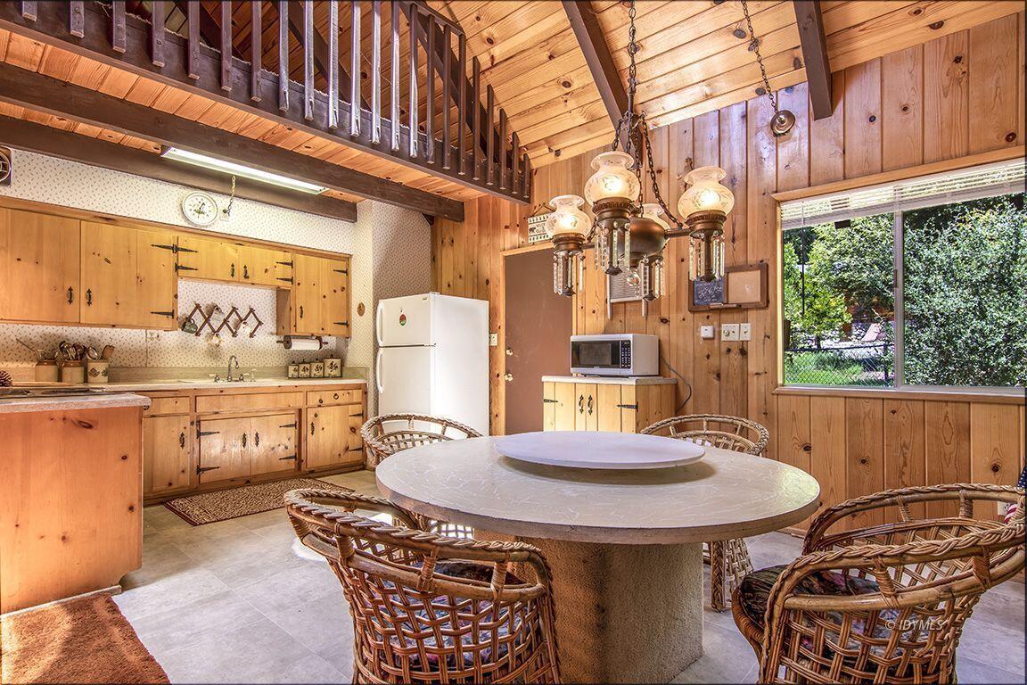 25075 Wood Road Idyllwild, CA 92549 - Photo 13 of 21 a outdoor dining space with furniture and outdoor view
