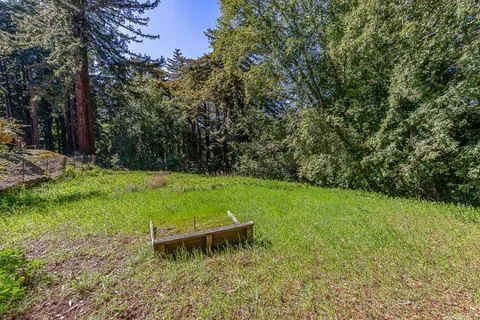 a view of a backyard with a garden