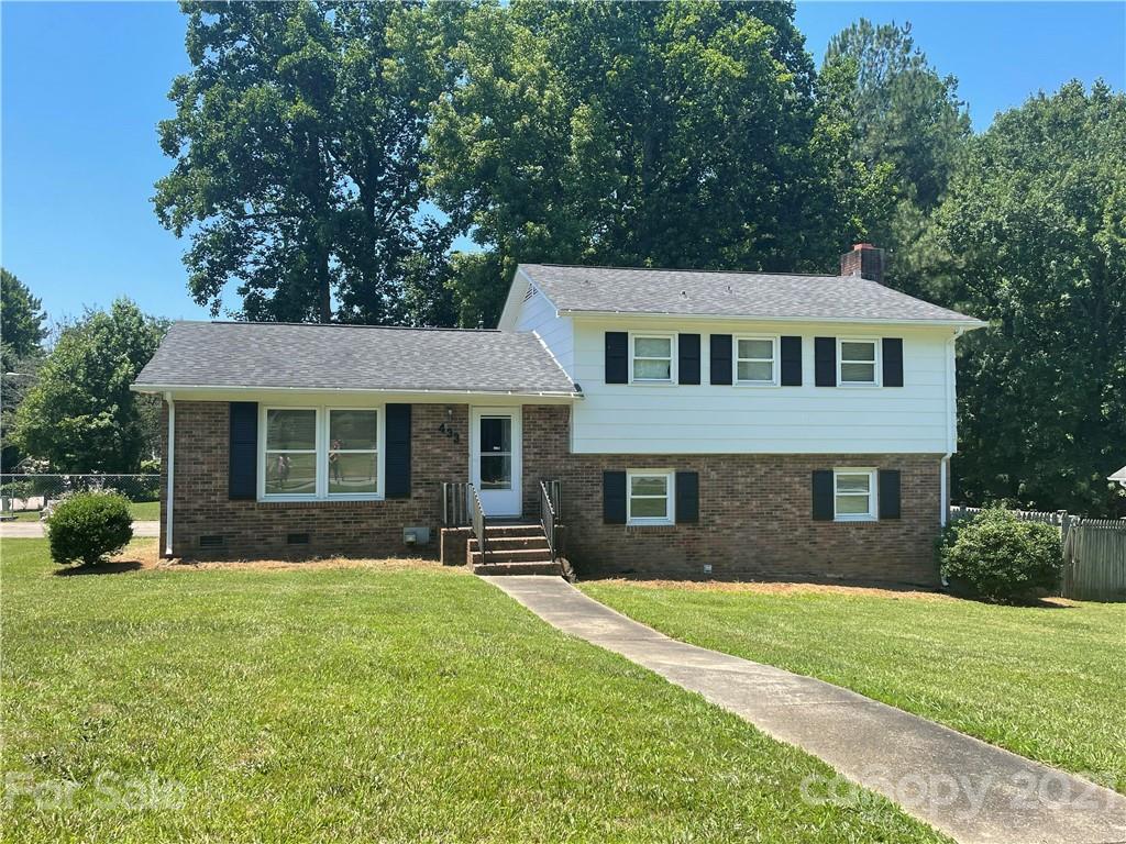 433 Willow Road Salisbury, NC 28147 - Photo 2 of 34 a front view of a house with a yard and porch
