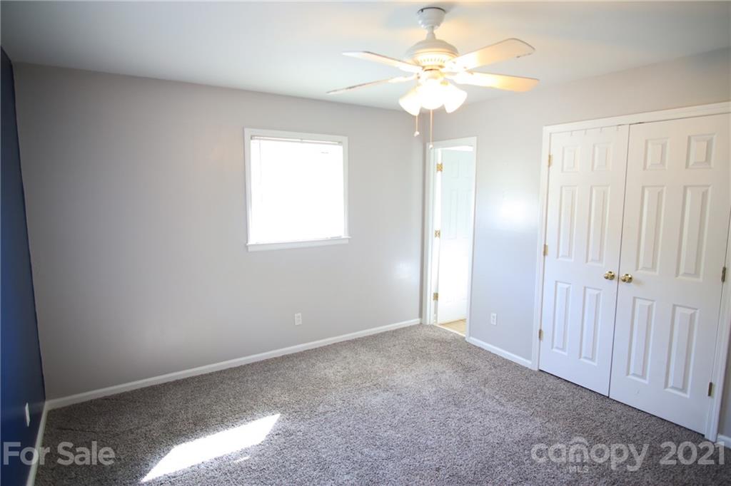 433 Willow Road Salisbury, NC 28147 - Photo 19 of 34 a view of an empty room with a window