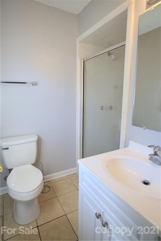 433 Willow Road Salisbury, NC 28147 - Photo 20 of 34 a bathroom with a toilet and a sink