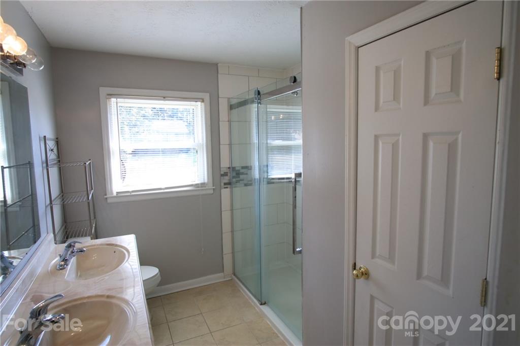433 Willow Road Salisbury, NC 28147 - Photo 25 of 34 a bathroom with a sink and toilet