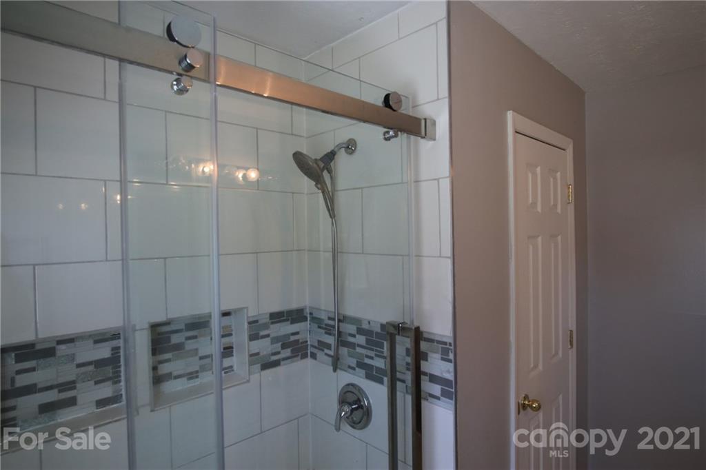 433 Willow Road Salisbury, NC 28147 - Photo 26 of 34 a bathroom with a shower and toilet