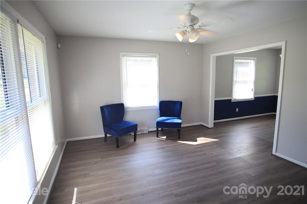 433 Willow Road Salisbury, NC 28147 - Photo 8 of 34 a living room with furniture and a lounge chair