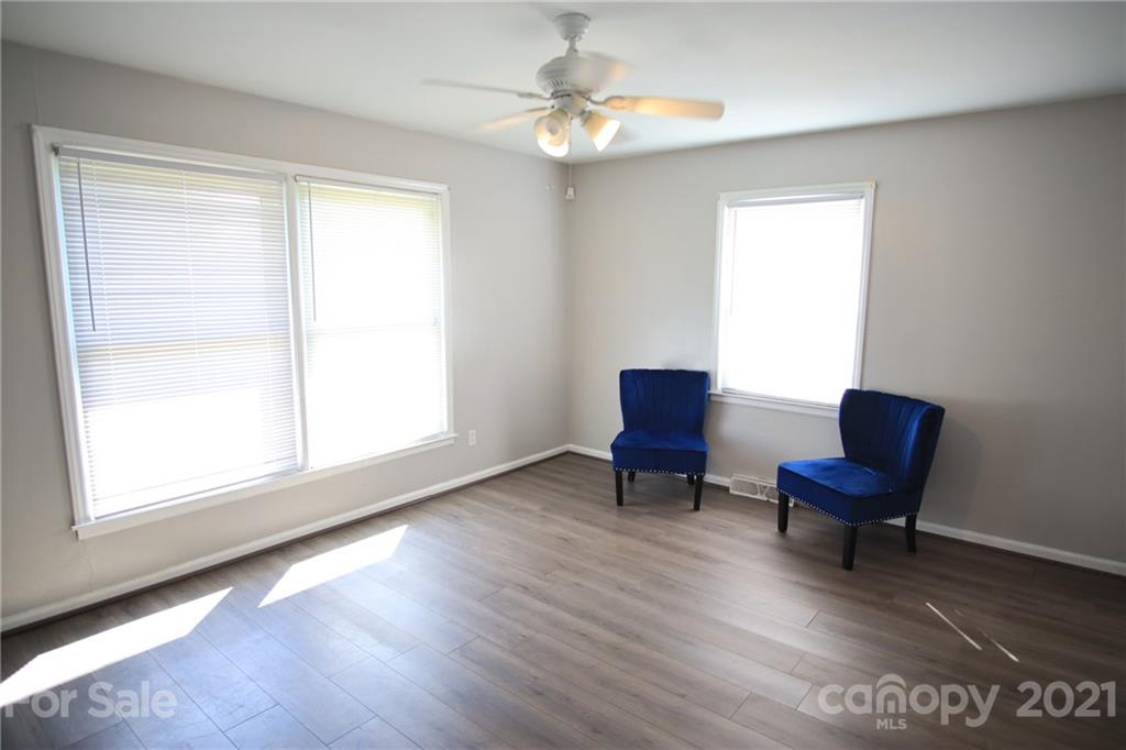 433 Willow Road Salisbury, NC 28147 - Photo 9 of 34 a view of a livingroom with chair and a window