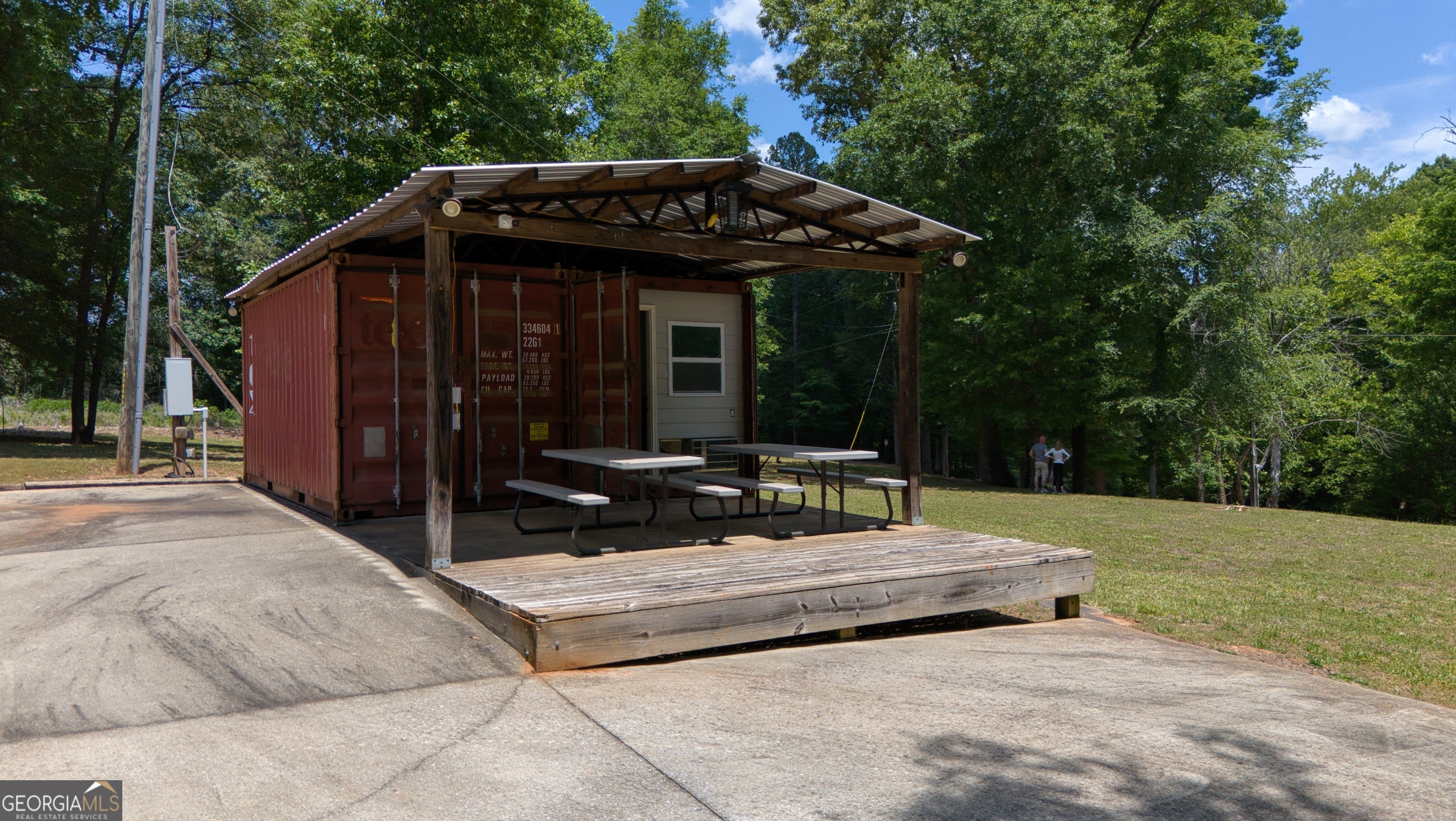 610 Kings Bridge Road Cave Spring, GA 30124 - Photo 62 of 72 a view of a house with backyard and sitting area