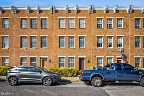 a car parked in front of a house