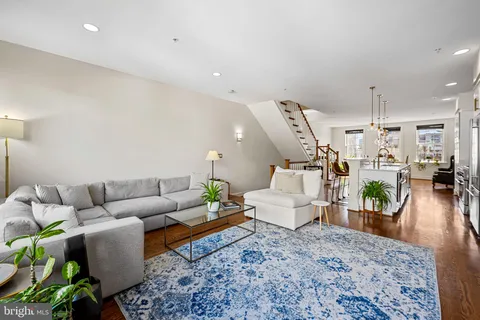 a terrace of a house with outdoor seating