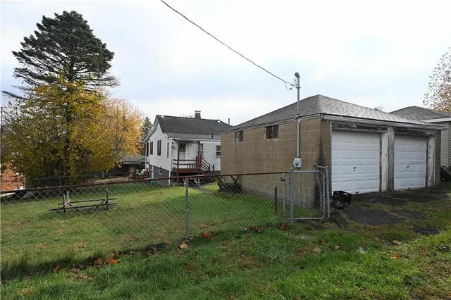a backyard of a house with entertaining space