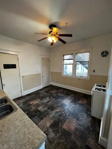 a view of a hallway with a window