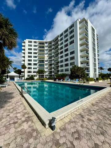 a view of swimming pool from outdoor space