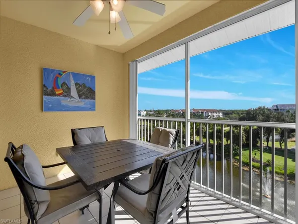 a view of a balcony dining area