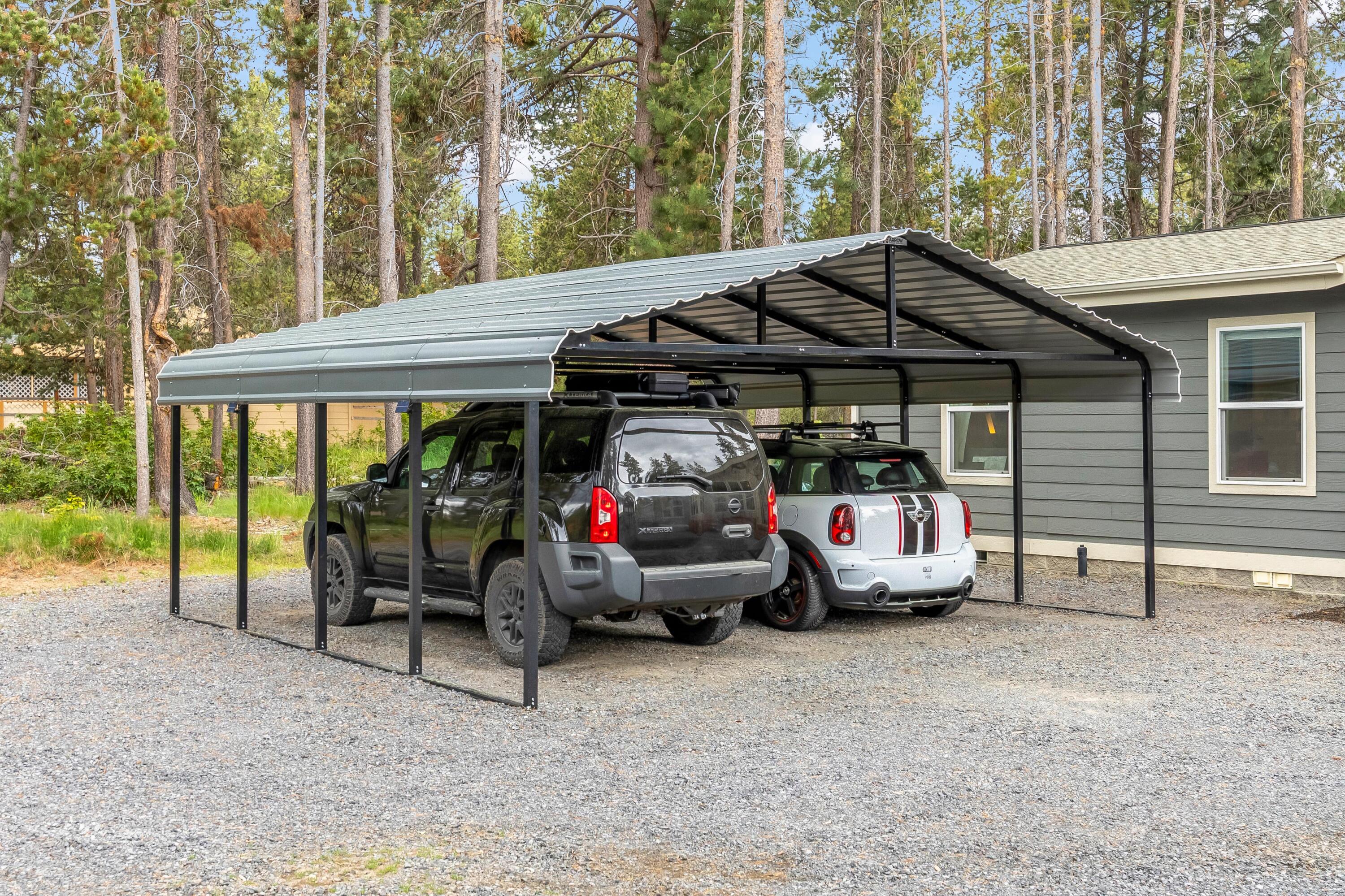 55823 Snow Goose Road Bend, OR 97707 - Photo 30 of 36 a view of garage with a car parked