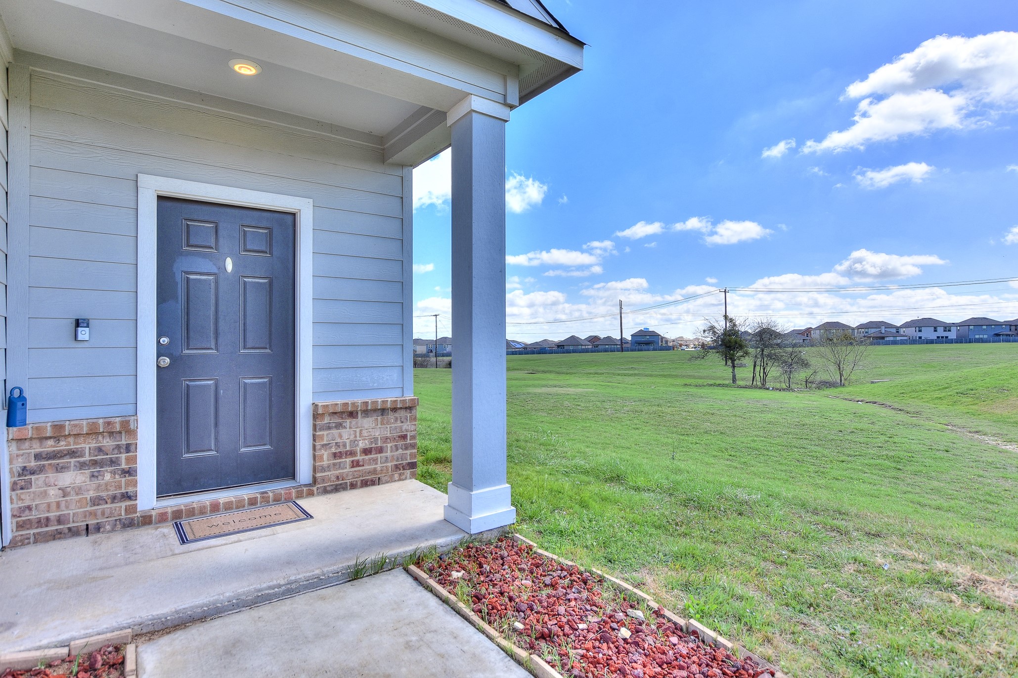 109 Helios Drive Jarrell, TX 76537 - Photo 4 of 36 a house view with a outdoor space