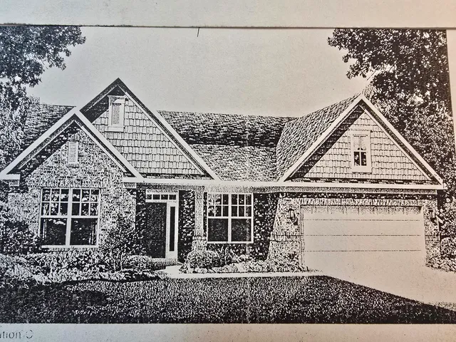 front view of a house with a dry gate