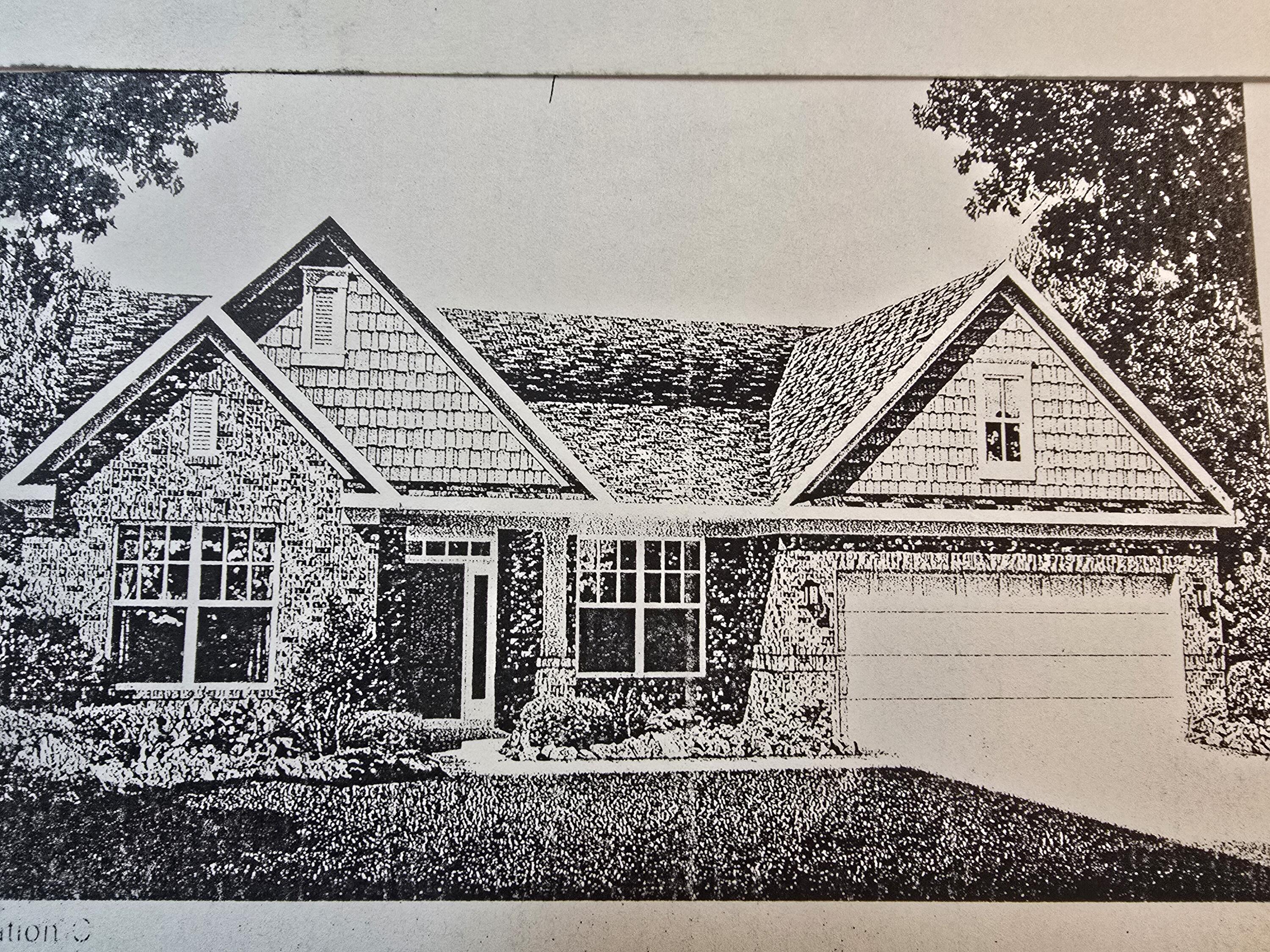 front view of a house with a dry gate