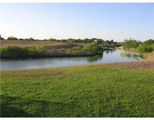 a view of a lake with a city