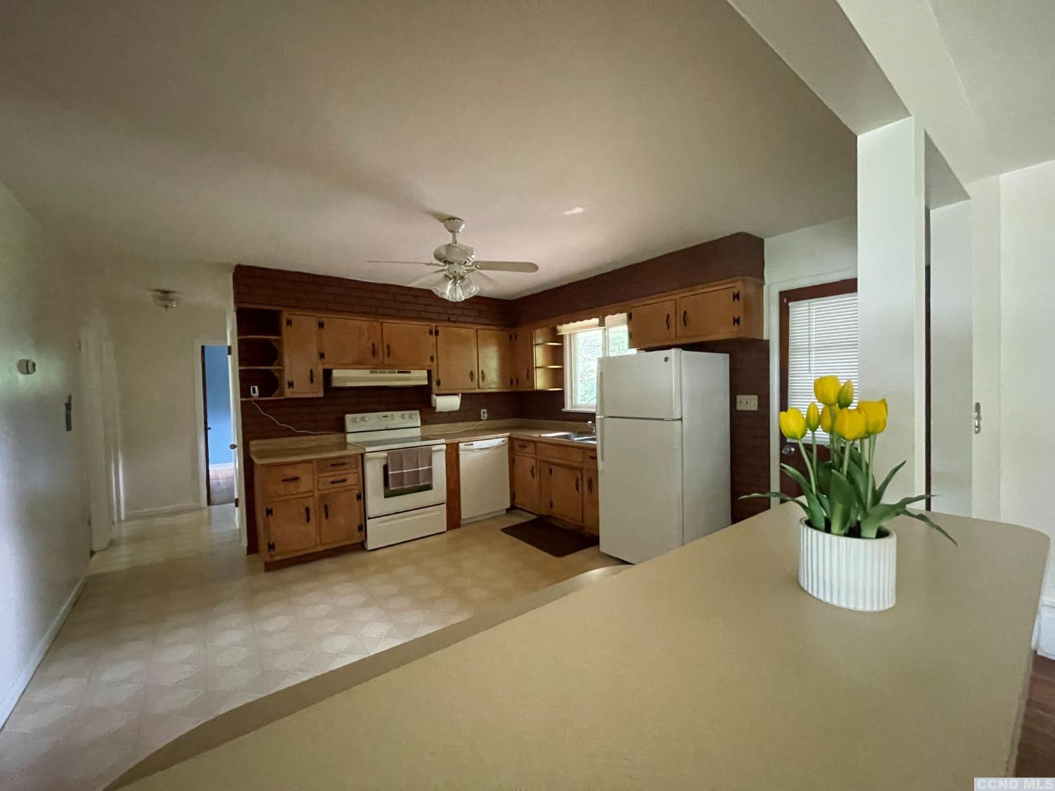 14 Cairo Junction Road Catskill, NY 12451 - Photo 7 of 25 a kitchen with a refrigerator and a stove top oven