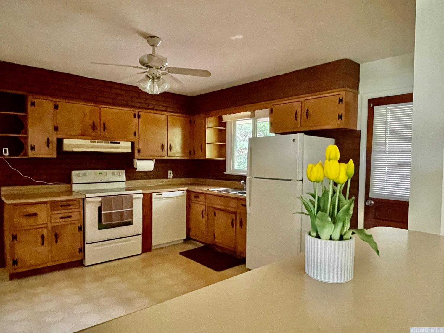 14 Cairo Junction Road Catskill, NY 12451 - Photo 8 of 25 a kitchen with a refrigerator and a stove