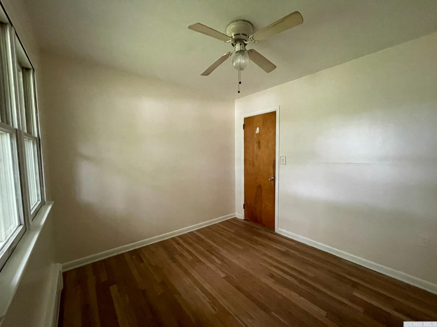 14 Cairo Junction Road Catskill, NY 12451 - Photo 9 of 25 a view of room with window and wooden floor