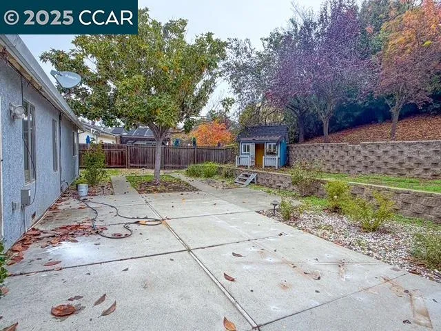 a backyard of a house with lots of green space