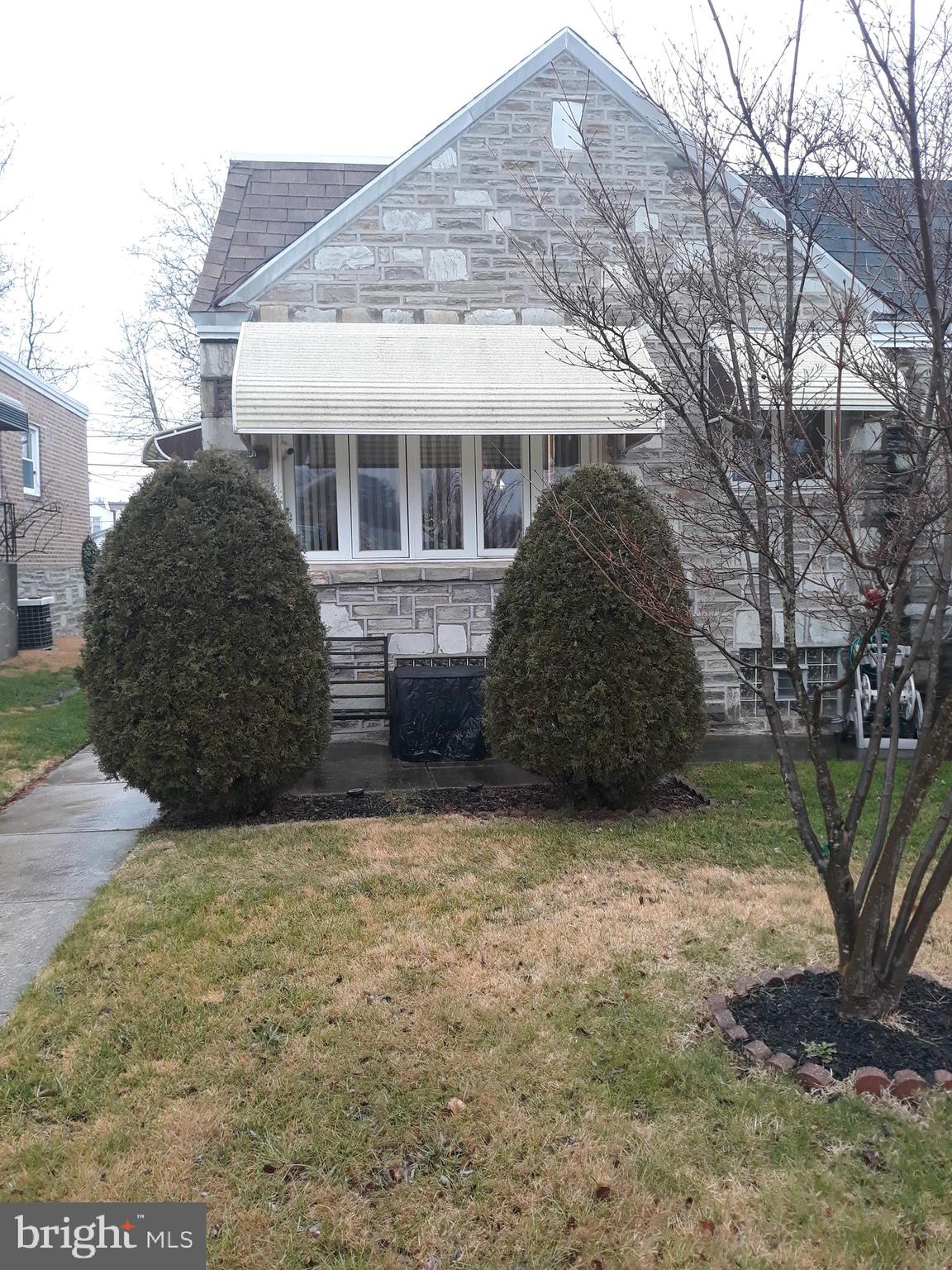 a view of a house with a garden