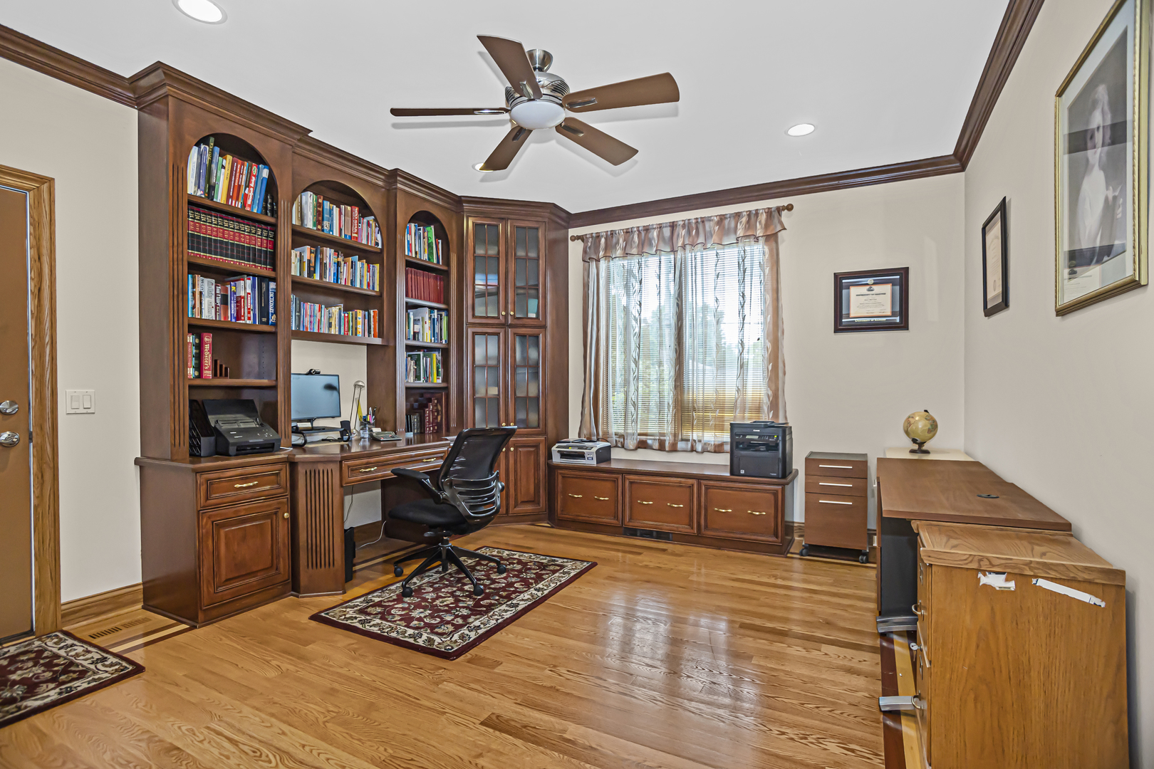 8040 West Charmaine Road Norridge, IL 60706 - Photo 11 of 62 a living room with furniture and a window