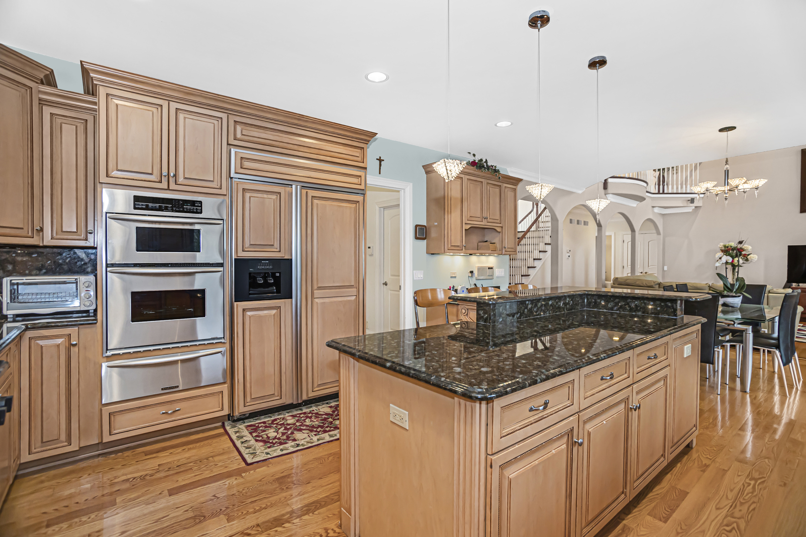 8040 West Charmaine Road Norridge, IL 60706 - Photo 19 of 62 a kitchen with stainless steel appliances granite countertop a stove and a cabinets