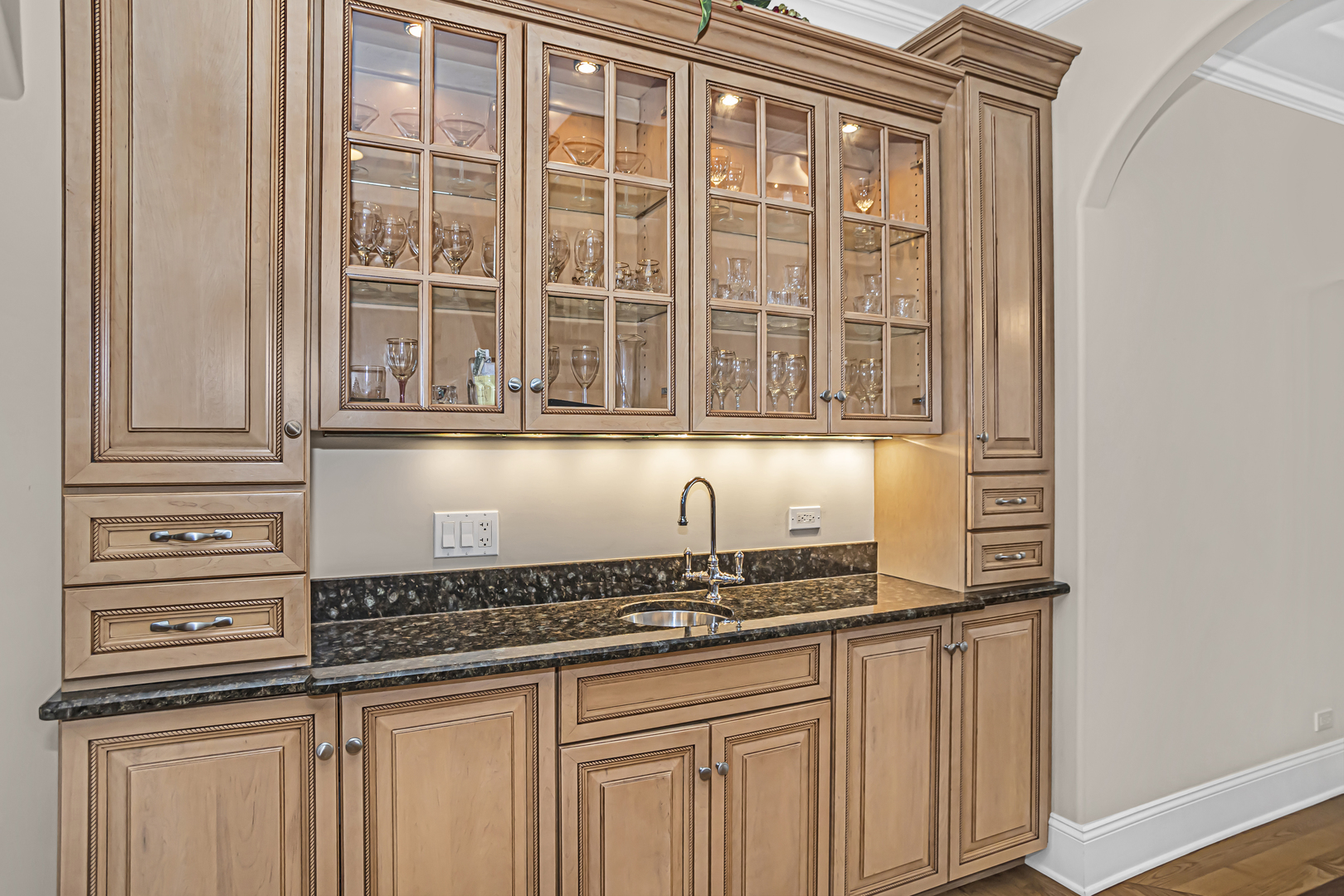 8040 West Charmaine Road Norridge, IL 60706 - Photo 20 of 62 a kitchen with stainless steel appliances granite countertop a sink and cabinets