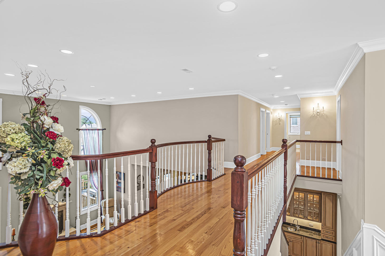 8040 West Charmaine Road Norridge, IL 60706 - Photo 25 of 62 a view of entryway with wooden floor and stairs