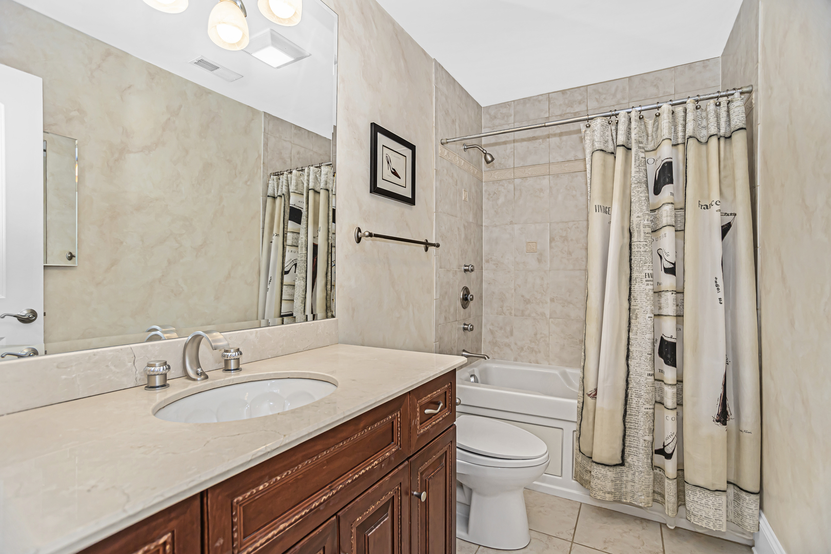 8040 West Charmaine Road Norridge, IL 60706 - Photo 34 of 62 a bathroom with a granite countertop sink toilet and shower