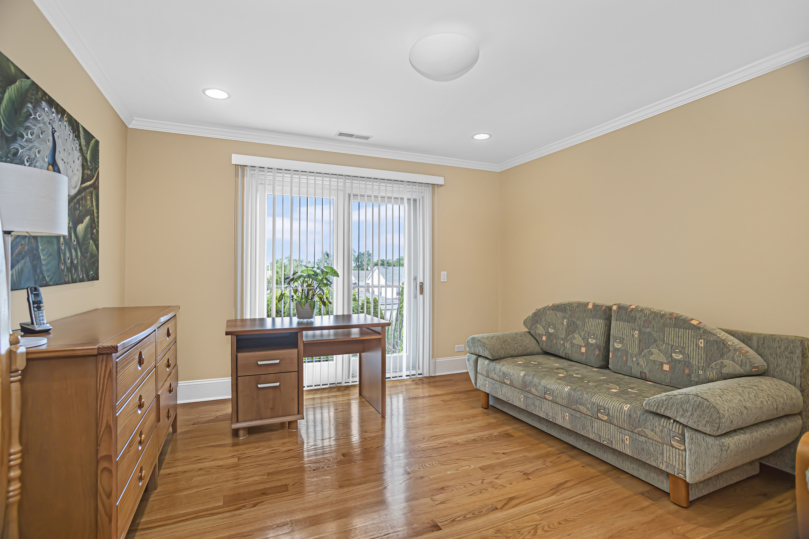 8040 West Charmaine Road Norridge, IL 60706 - Photo 37 of 62 a living room with furniture and a wooden floor