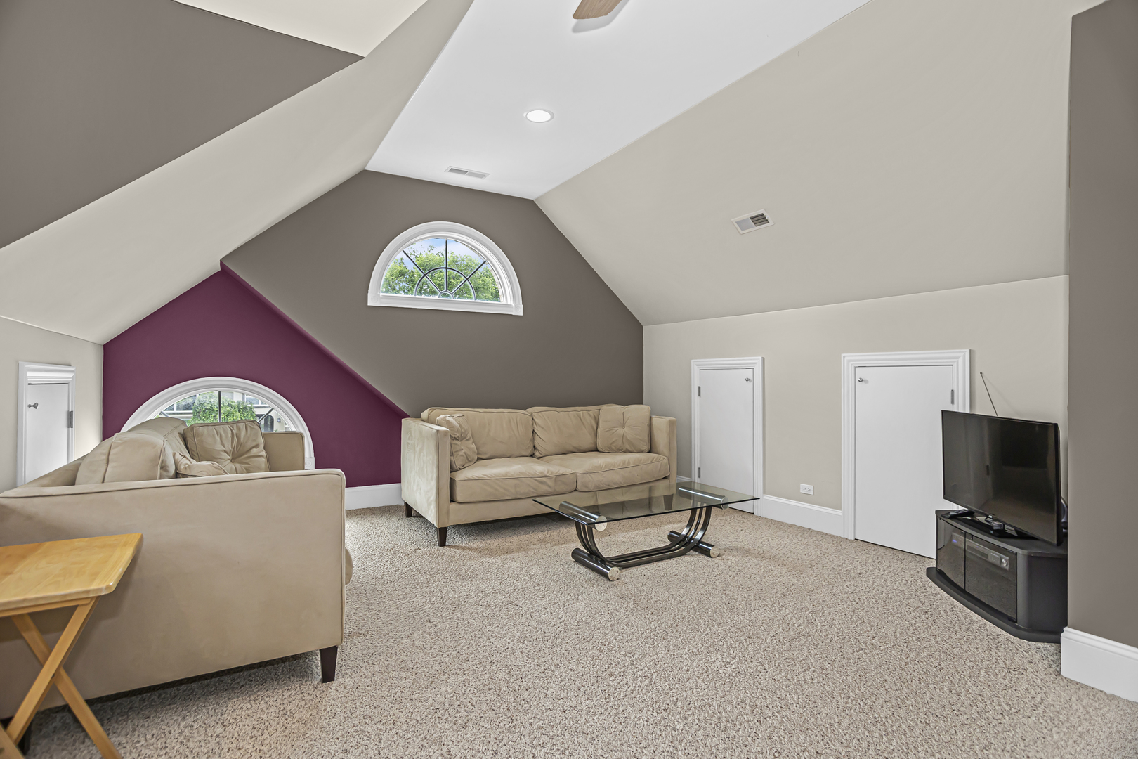 8040 West Charmaine Road Norridge, IL 60706 - Photo 40 of 62 a living room with furniture and a flat screen tv