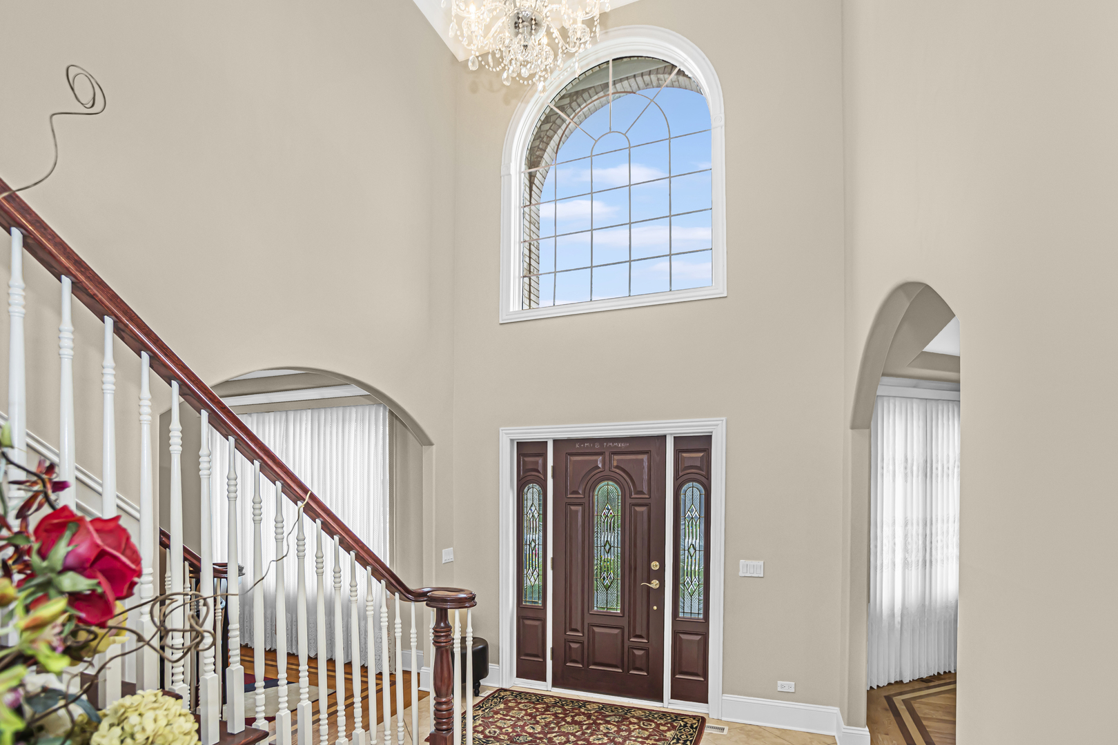 8040 West Charmaine Road Norridge, IL 60706 - Photo 4 of 62 a view of entryway with wooden floor and stairs