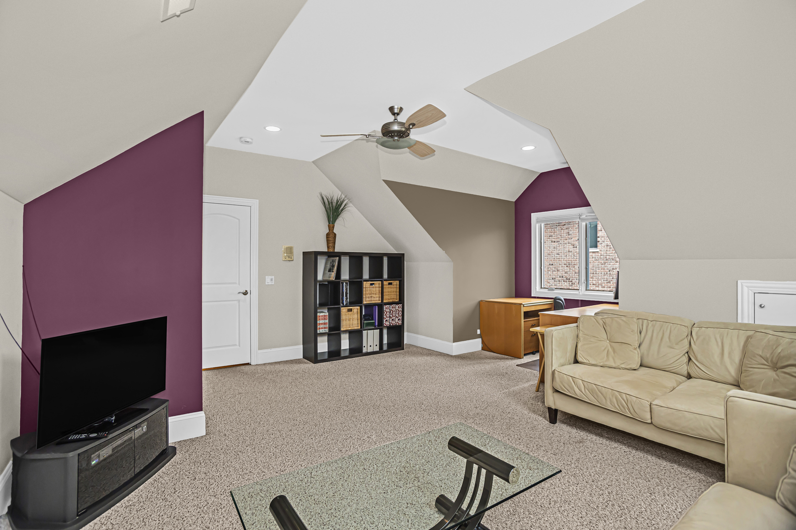 8040 West Charmaine Road Norridge, IL 60706 - Photo 41 of 62 a living room with furniture and a flat screen tv