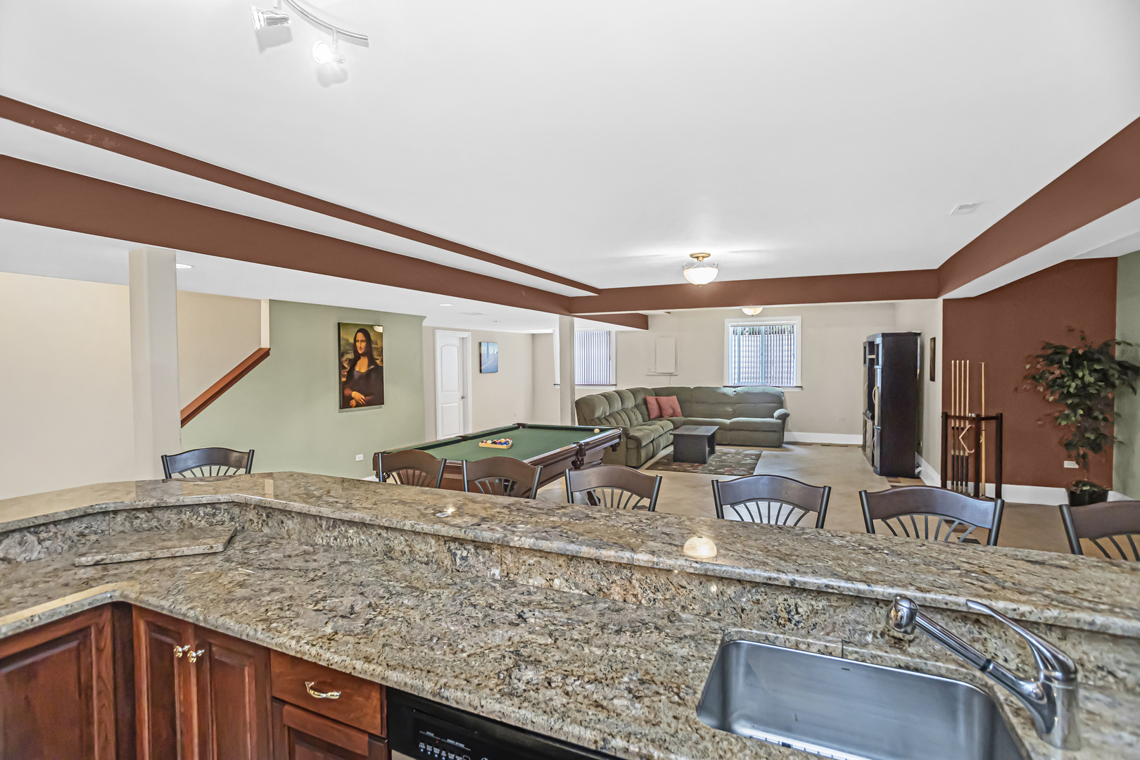 8040 West Charmaine Road Norridge, IL 60706 - Photo 45 of 62 a view of living room with granite countertop furniture and garden view
