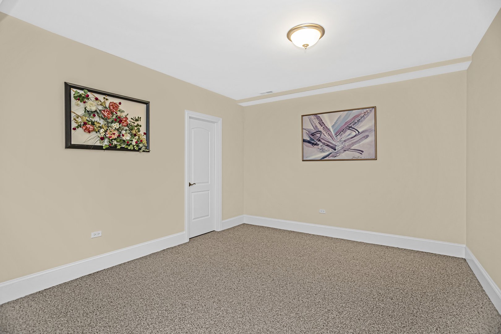 8040 West Charmaine Road Norridge, IL 60706 - Photo 50 of 62 an empty room with a painting on the wall