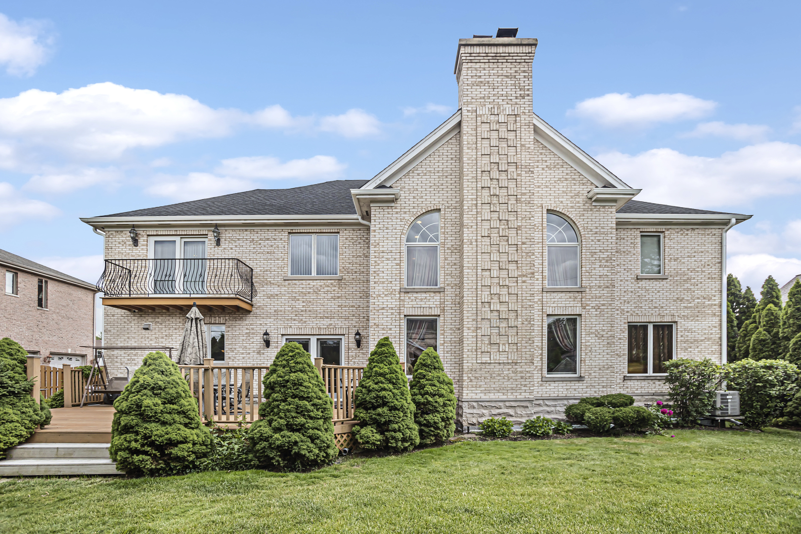 8040 West Charmaine Road Norridge, IL 60706 - Photo 57 of 62 a front view of a house with a garden