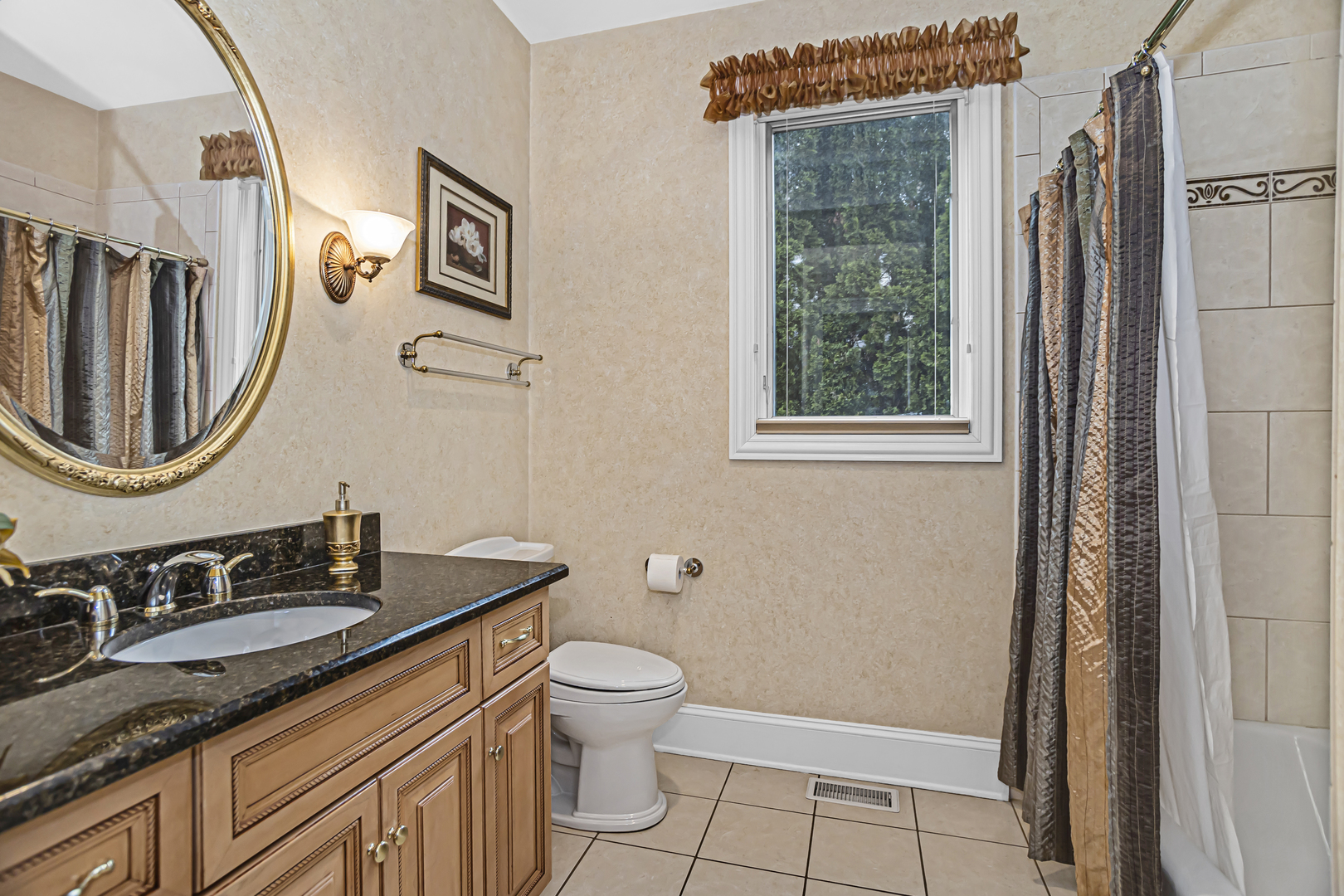 8040 West Charmaine Road Norridge, IL 60706 - Photo 9 of 62 a bathroom with a granite countertop sink toilet and shower