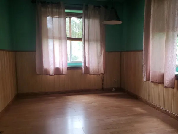 an empty room with windows