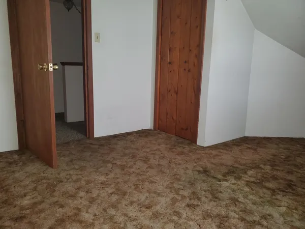 an empty room with closet