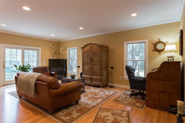34 Bellflower Street Lexington, MA 02421 - Photo 8 of 21 a living room with furniture and a flat screen tv