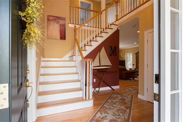 34 Bellflower Street Lexington, MA 02421 - Photo 10 of 21 a view of entryway and hall with wooden floor