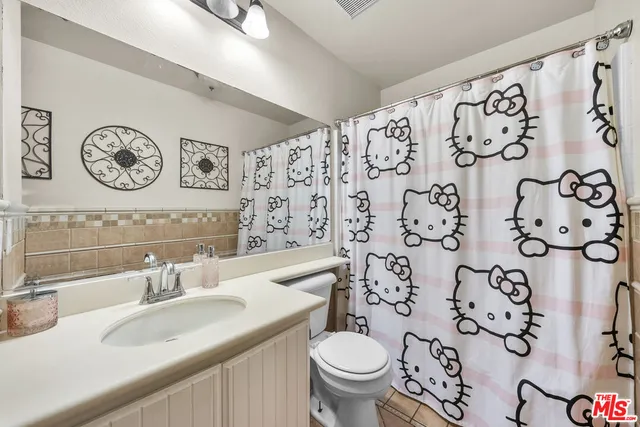 a bathroom with a sink and a toilet