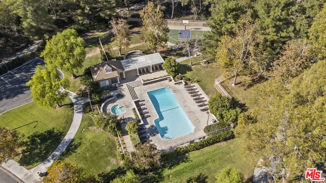 an aerial view of residential house with outdoor space